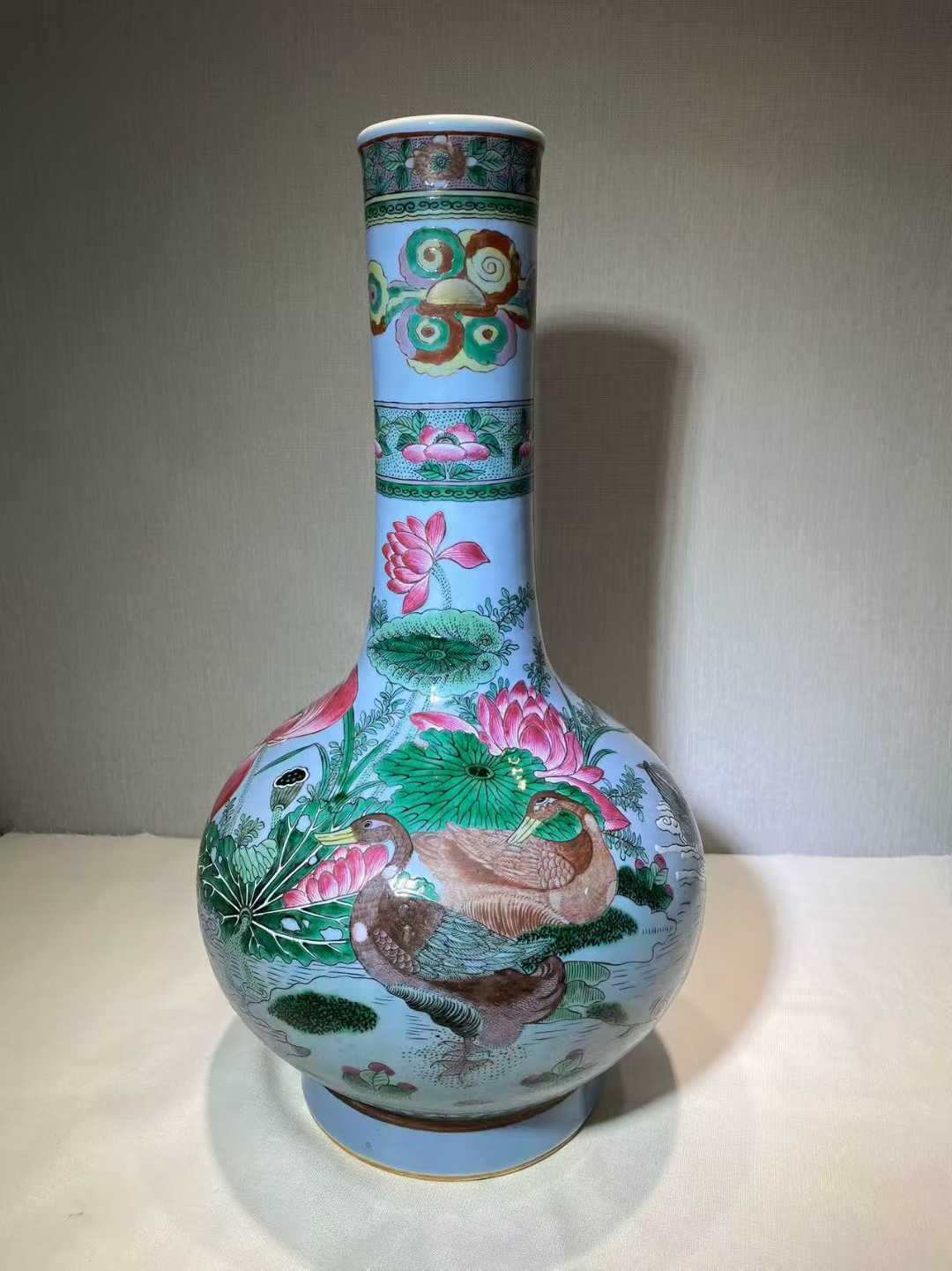 天蓝釉加粉彩荷塘鸳鸯长颈瓶