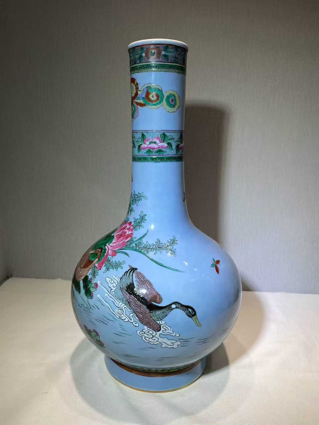 天蓝釉加粉彩荷塘鸳鸯长颈瓶