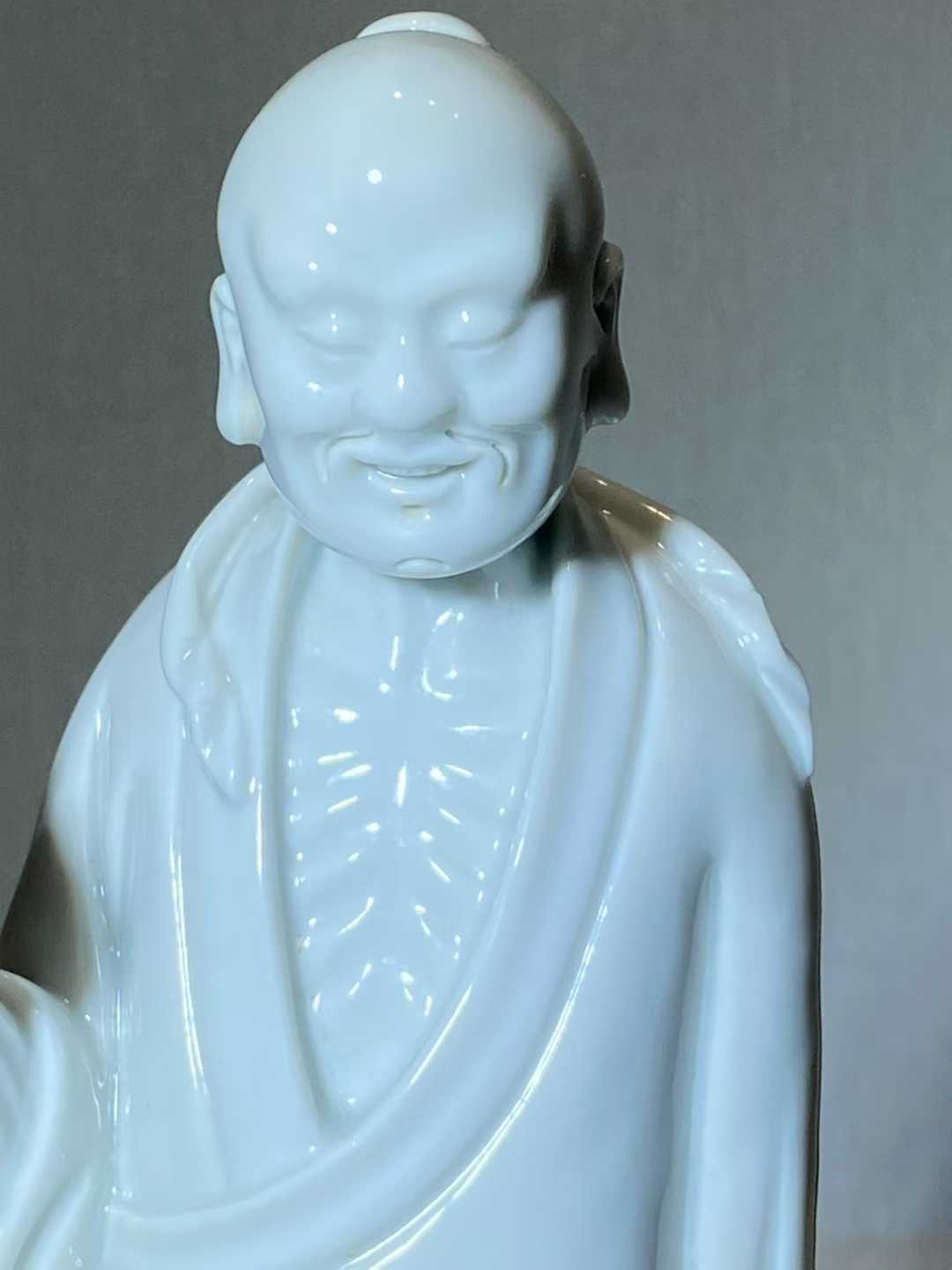 德化窑白釉东方塑立像 款：何朝宗